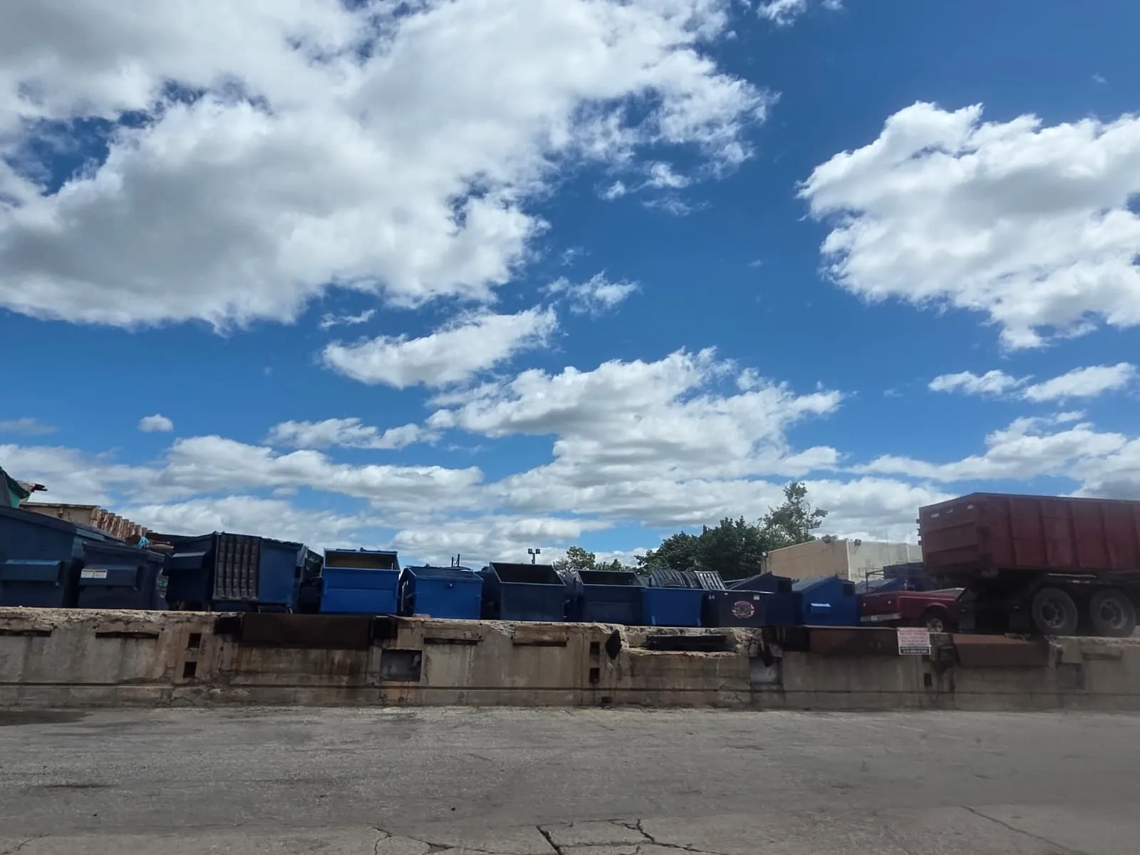 Self-contained commercial waste compactor serviced by Metro Waste Solutions