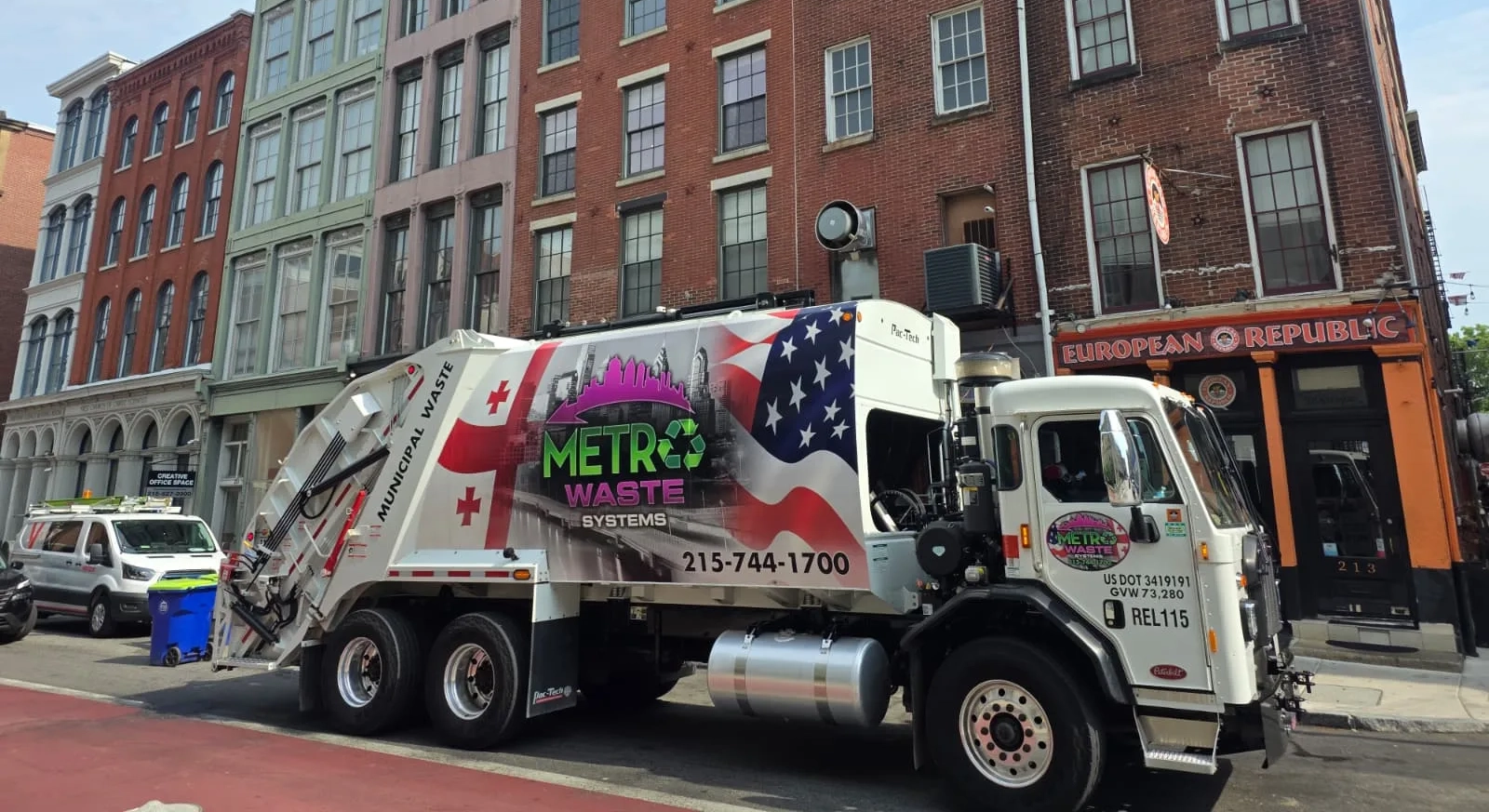 Commercial waste truck servicing a Warminster, PA business