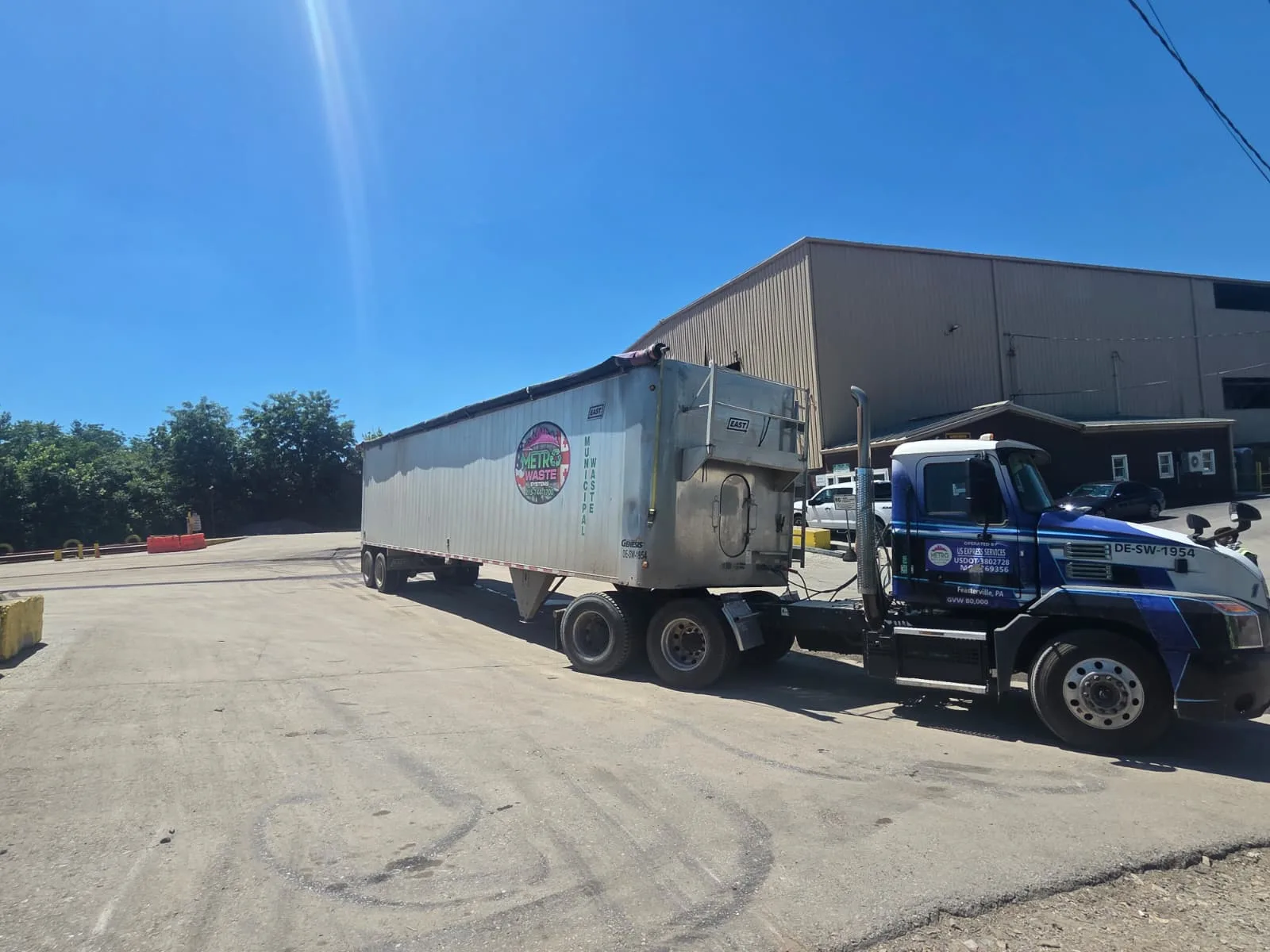 Commercial property cleanout and roll-off container on a Philadelphia jobsite