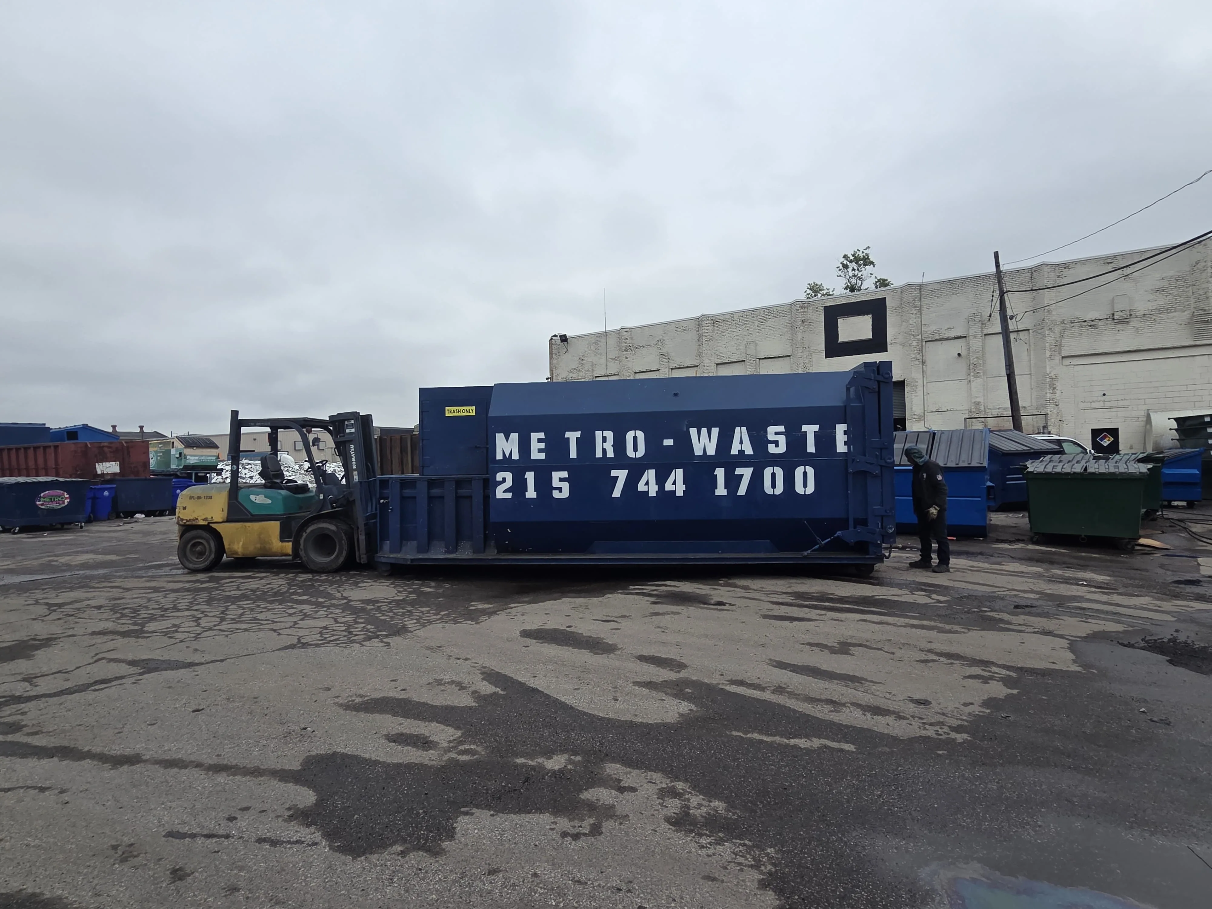 Inside Metro Waste Solutions fleet maintenance facility — commercial garbage trucks serviced for Philadelphia metro routes — photo 11