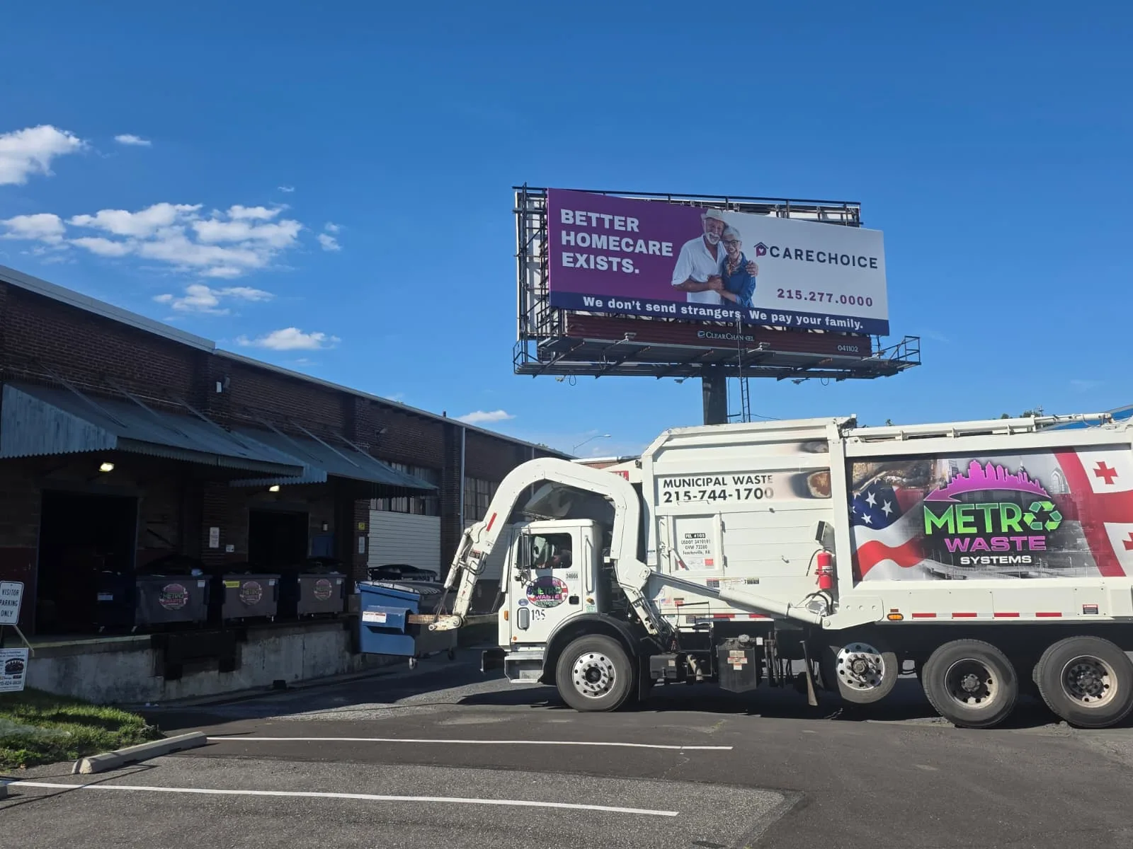 Metro Waste front-loader truck on a commercial route