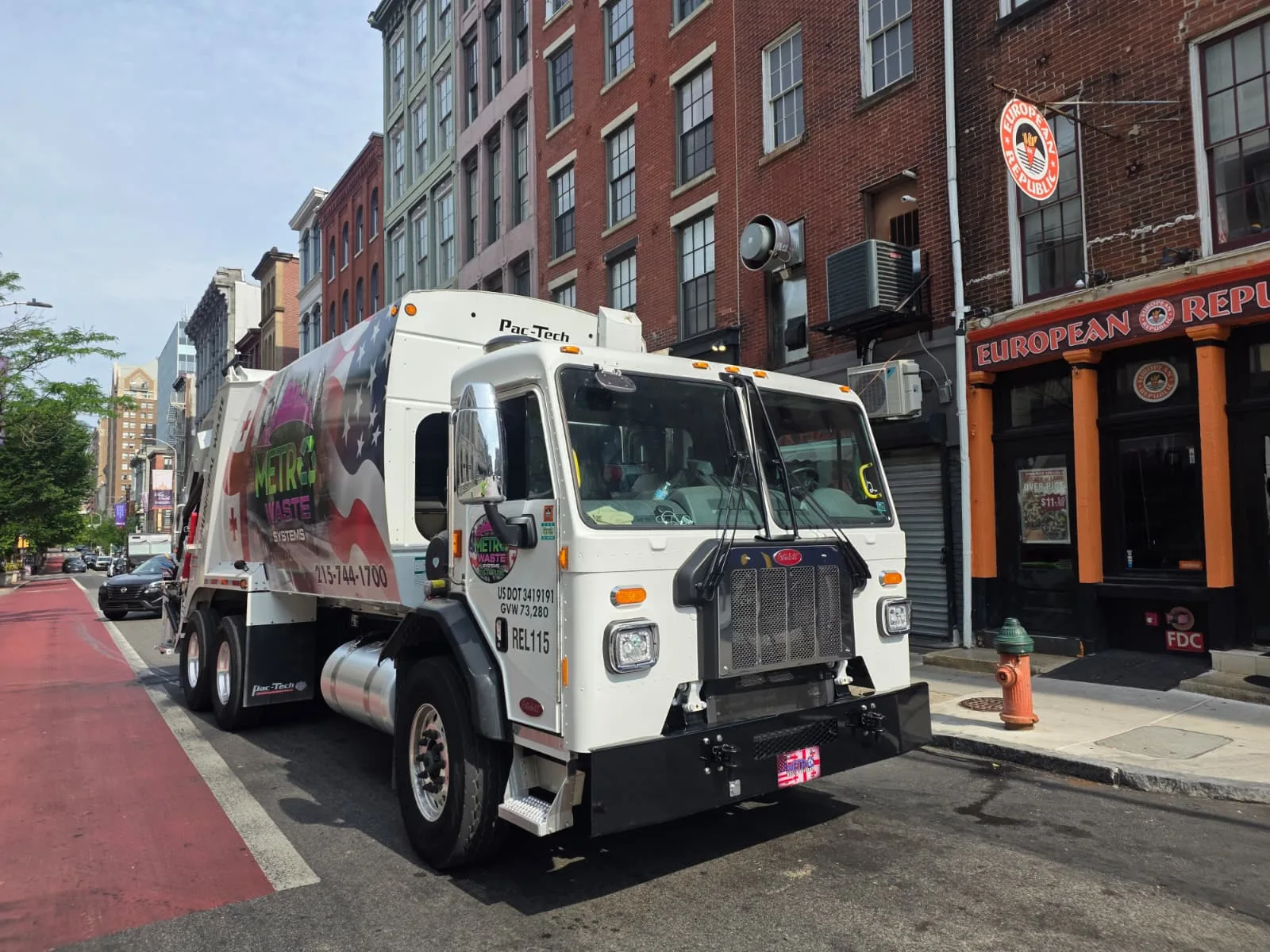Metro Waste truck running an after-hours collection route at night
