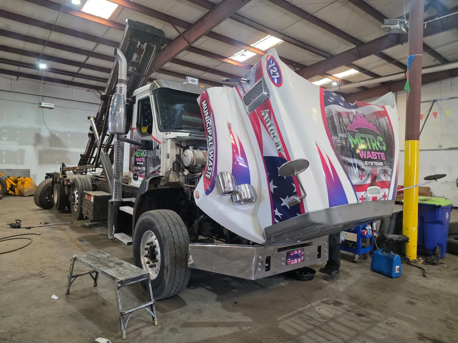Metro Waste Solutions roll-off delivery in the Philadelphia metro area — real fleet photo 2