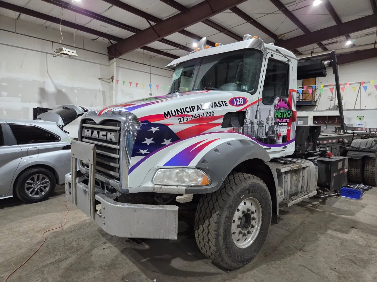 Metro Waste Solutions roll-off delivery in the Philadelphia metro area — real fleet photo 10